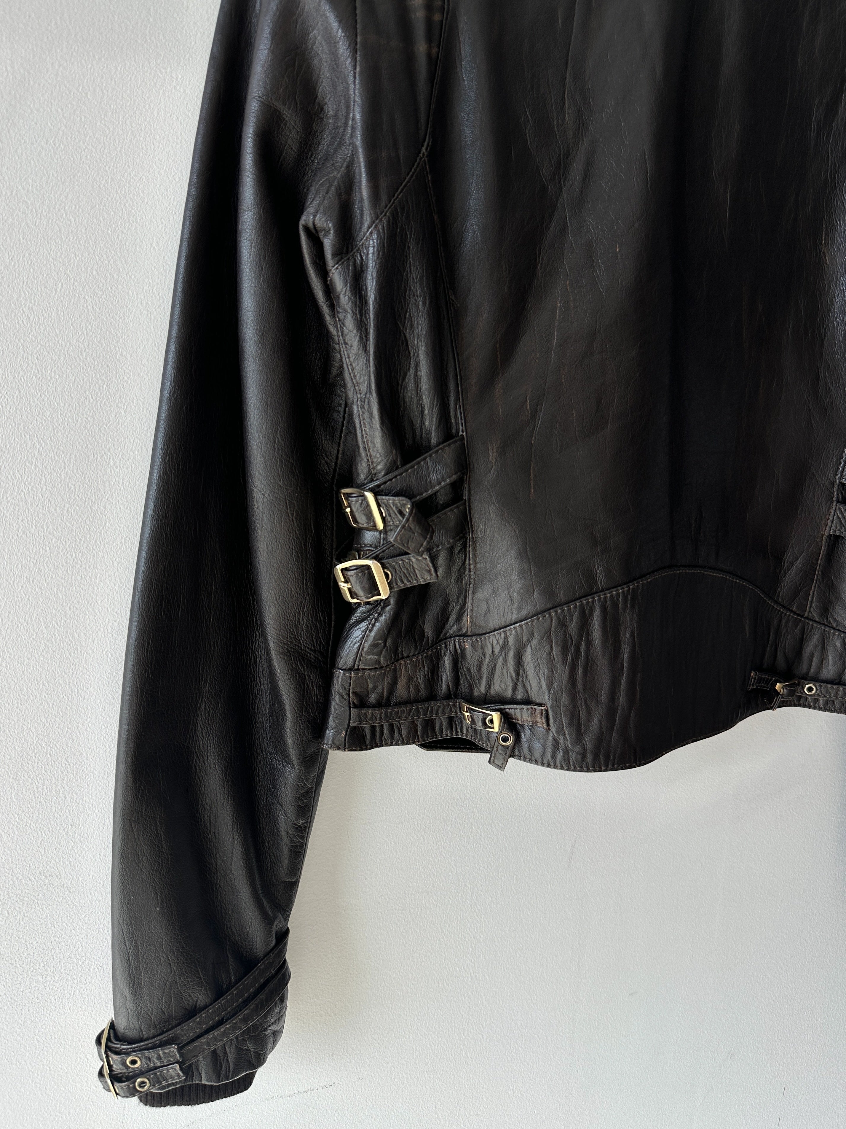 VERSACE - 2000s CROP FIT LEATHER JACKET WITH BONDAGE DETAILS