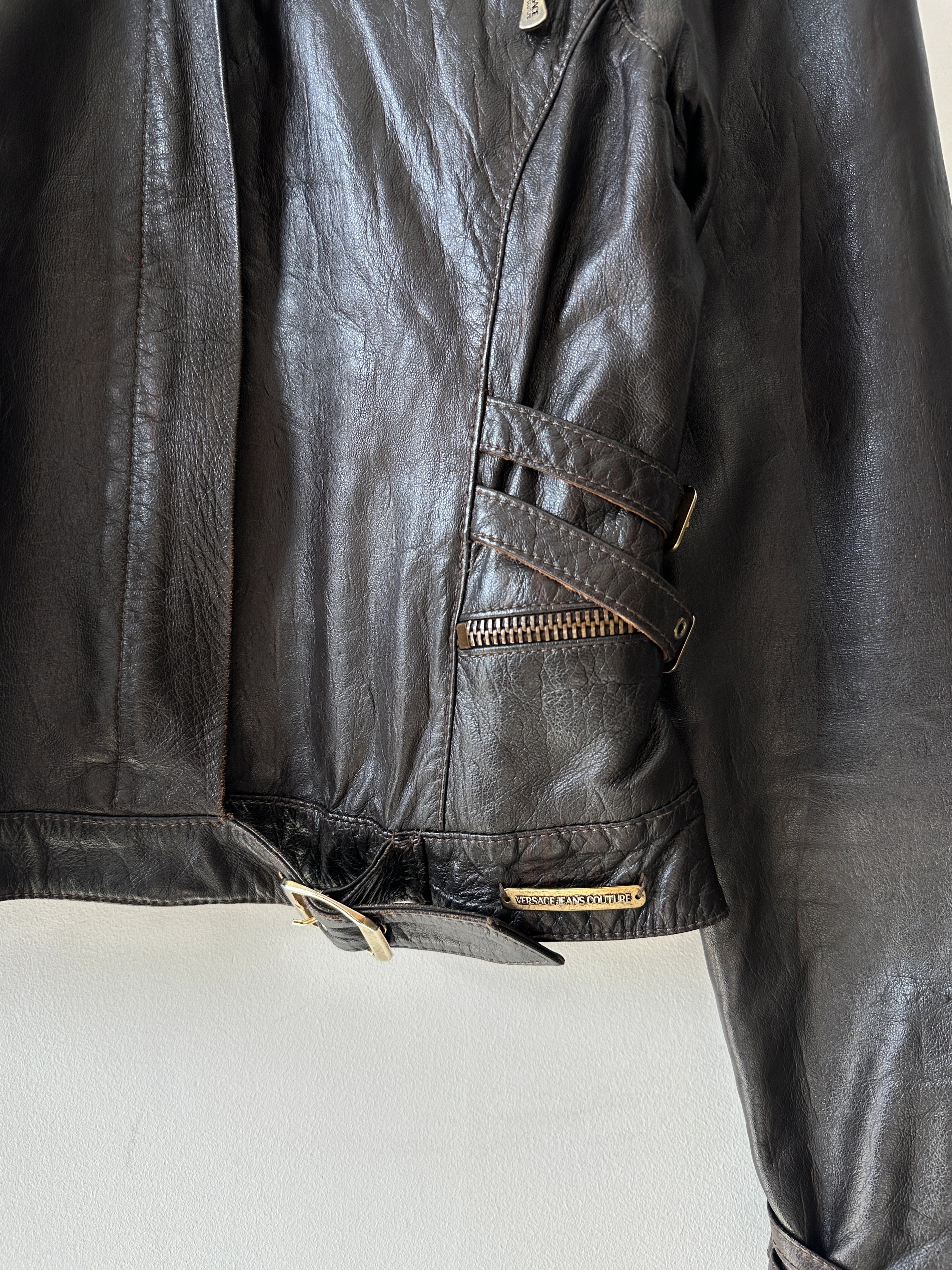 VERSACE - 2000s CROP FIT LEATHER JACKET WITH BONDAGE DETAILS