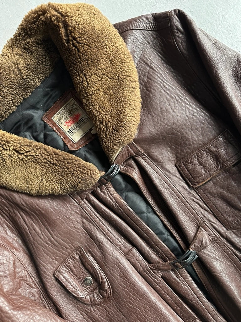 MARITHÉ + FRANÇOIS GIRBAUD X COMPAGNIE DES MONTAGNES & DES FORETS - 1980s FUR COLLAR LEATHER MIDI JACKET WITH METAL HOOKS FRONT CLOSURE