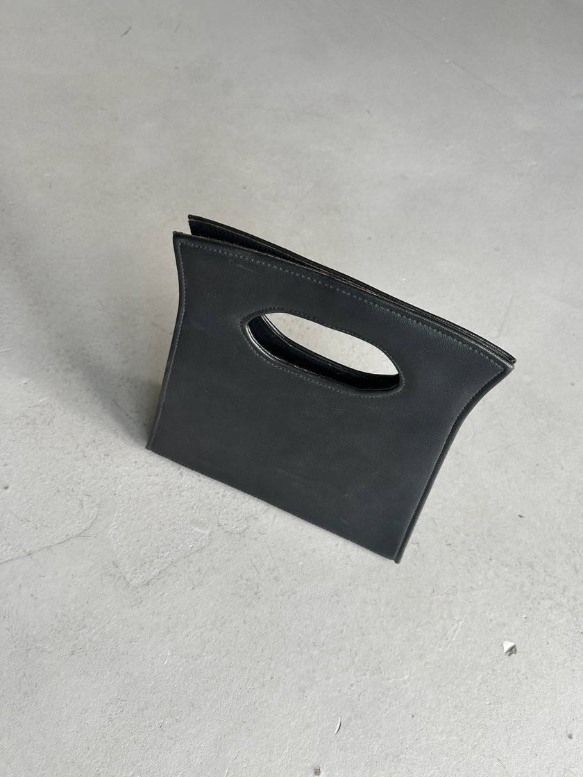1990s CUT OUT HANDLE LEATHER BAG