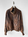 MARITHÉ & FRANÇOIS GIRBAUD X COMPAGNIE DES MONTAGNES & DES FORÊTS - 1980s DISTRESSED LEATHER BOMBER JACKET WITH HIGH RIBBED NECK