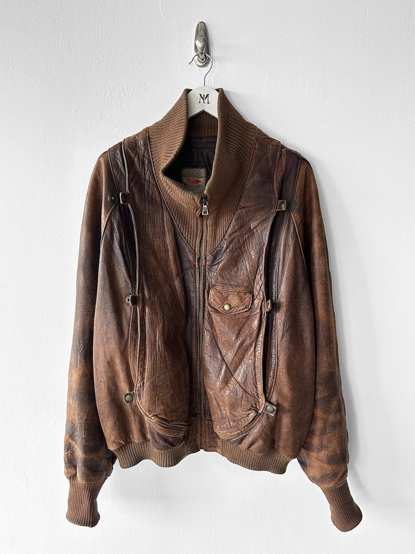 MARITHÉ & FRANÇOIS GIRBAUD X COMPAGNIE DES MONTAGNES & DES FORÊTS - 1980s DISTRESSED LEATHER BOMBER JACKET WITH HIGH RIBBED NECK