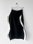 ISSEY MIYAKE -  F/W 2023 SCULPTURAL SKIRT WITH CURVED SIDE PANELS