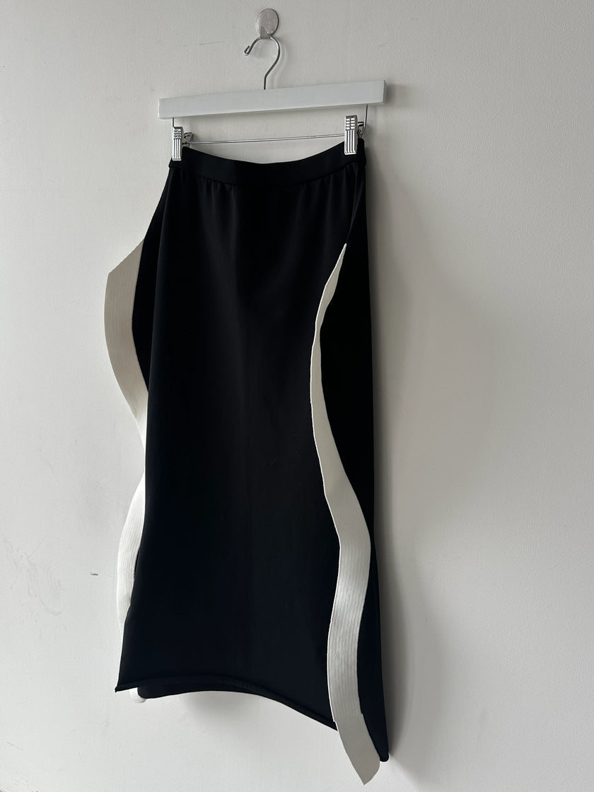 ISSEY MIYAKE -  F/W 2023 SCULPTURAL SKIRT WITH CURVED SIDE PANELS