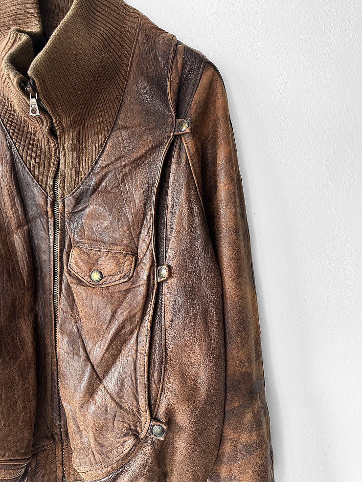 MARITHÉ & FRANÇOIS GIRBAUD X COMPAGNIE DES MONTAGNES & DES FORÊTS - 1980s DISTRESSED LEATHER BOMBER JACKET WITH HIGH RIBBED NECK