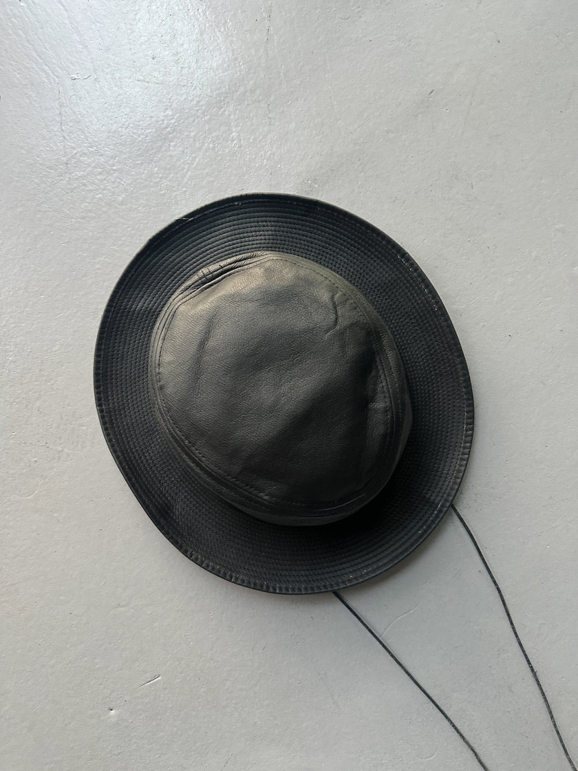 AGNÈS B. - 1990s FAUX LEATHER HAT WITH LONG CHIN STRAP