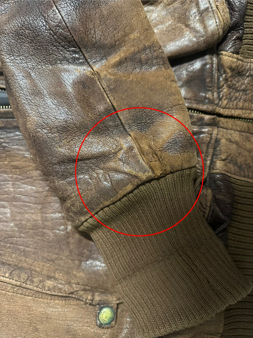 MARITHÉ & FRANÇOIS GIRBAUD X COMPAGNIE DES MONTAGNES & DES FORÊTS - 1980s DISTRESSED LEATHER BOMBER JACKET WITH HIGH RIBBED NECK