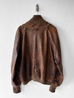 MARITHÉ & FRANÇOIS GIRBAUD X COMPAGNIE DES MONTAGNES & DES FORÊTS - 1980s DISTRESSED LEATHER BOMBER JACKET WITH HIGH RIBBED NECK