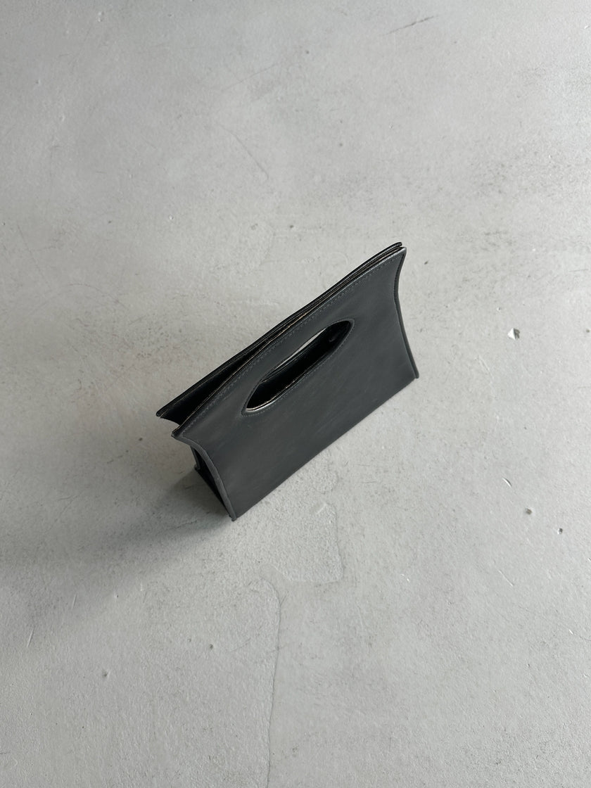 1990s CUT OUT HANDLE LEATHER BAG