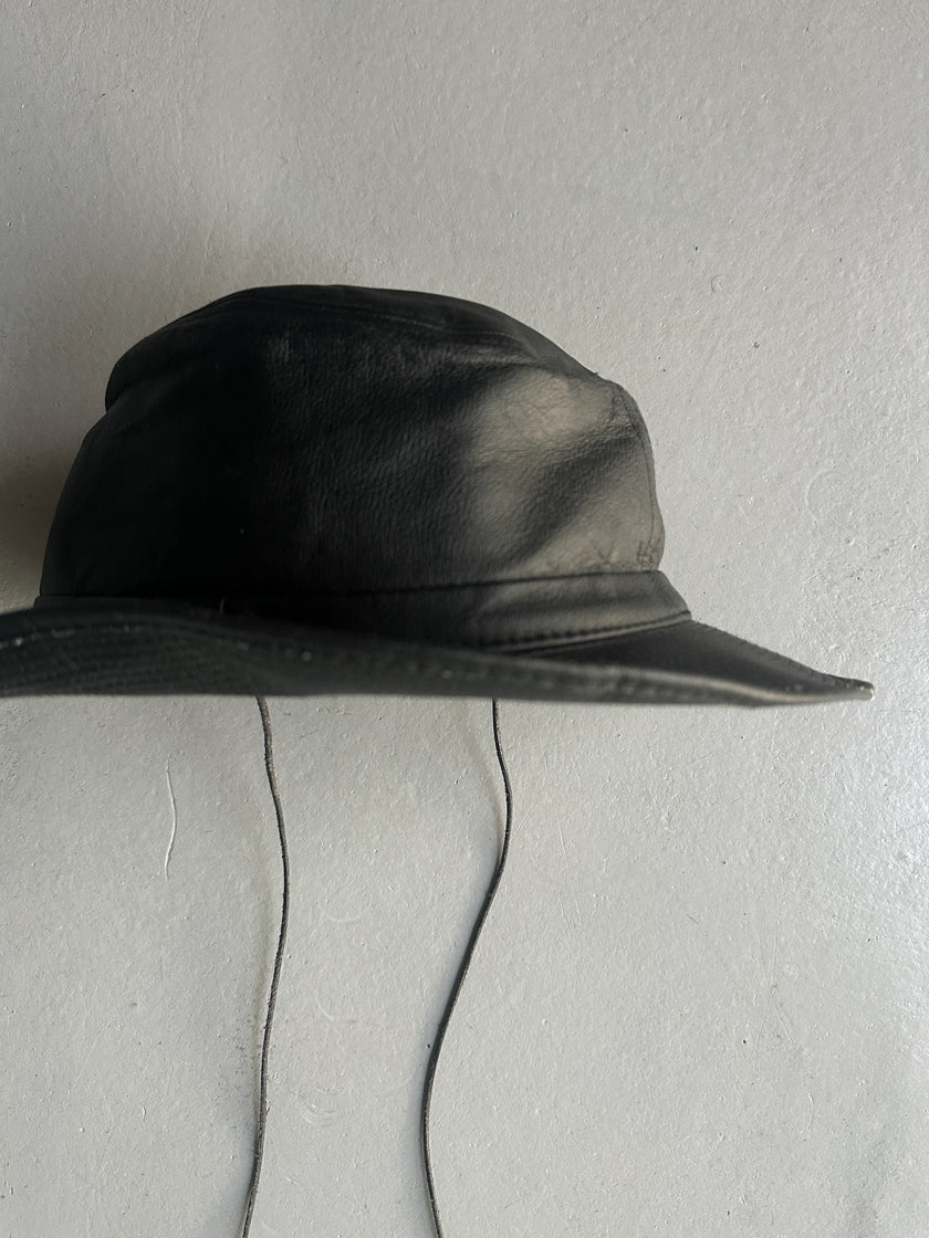 AGNÈS B. - 1990s FAUX LEATHER HAT WITH LONG CHIN STRAP