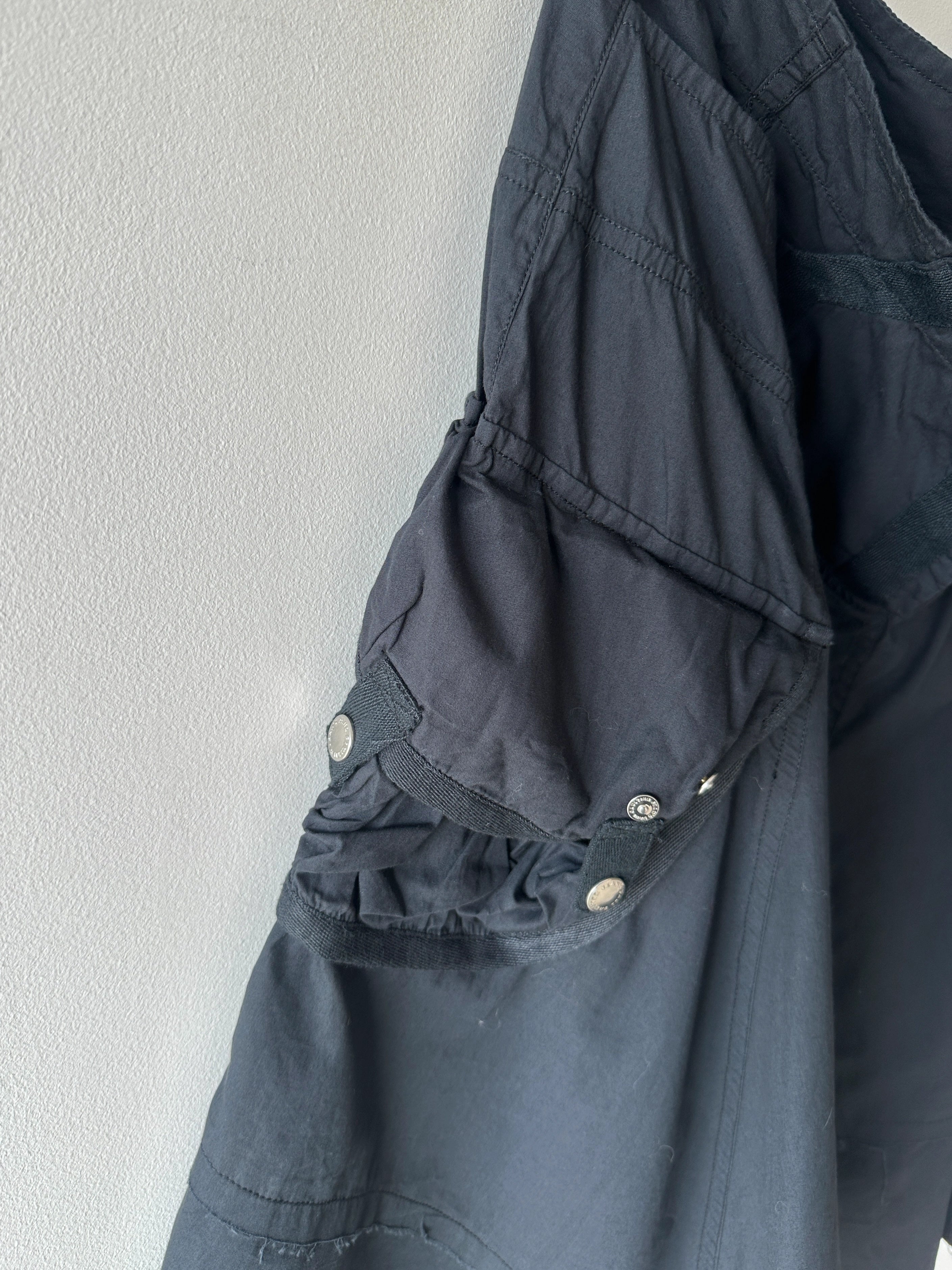 JEAN PAUL GAULTIER - 2000s PANELED SKIRT WITH FRAYED HEM DETAILS