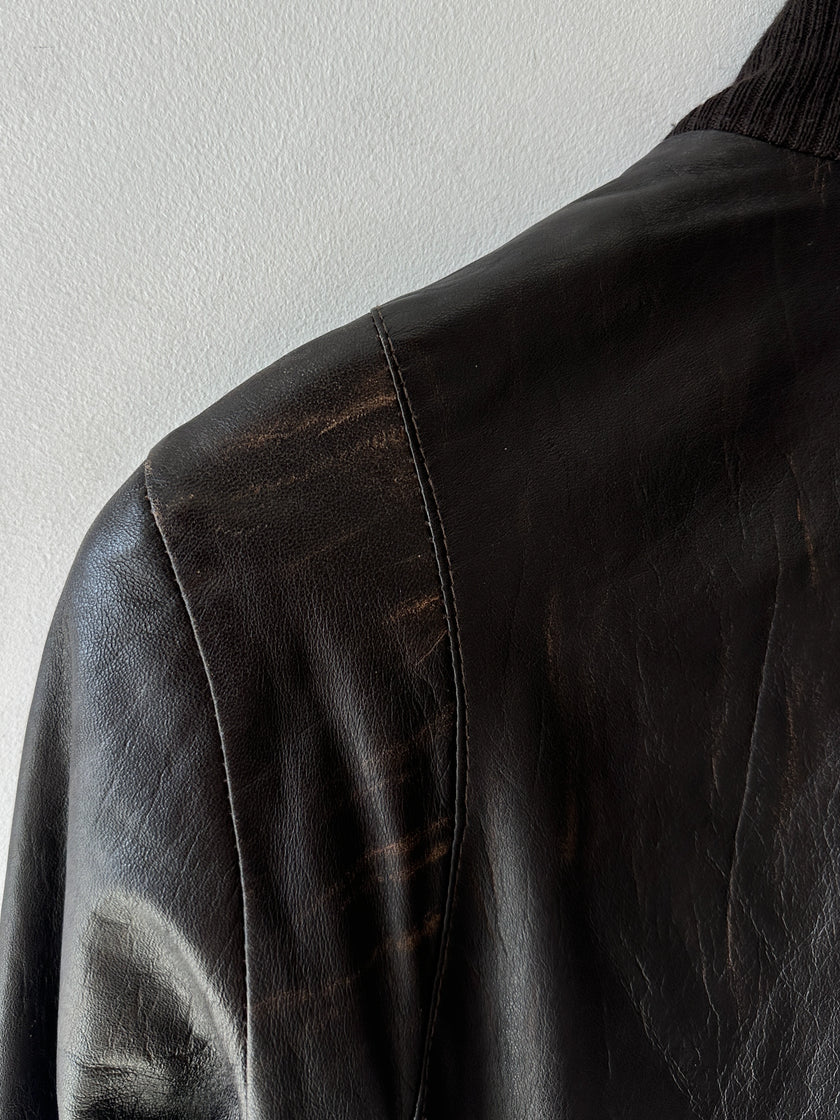 VERSACE - 2000s CROP FIT LEATHER JACKET WITH BONDAGE DETAILS