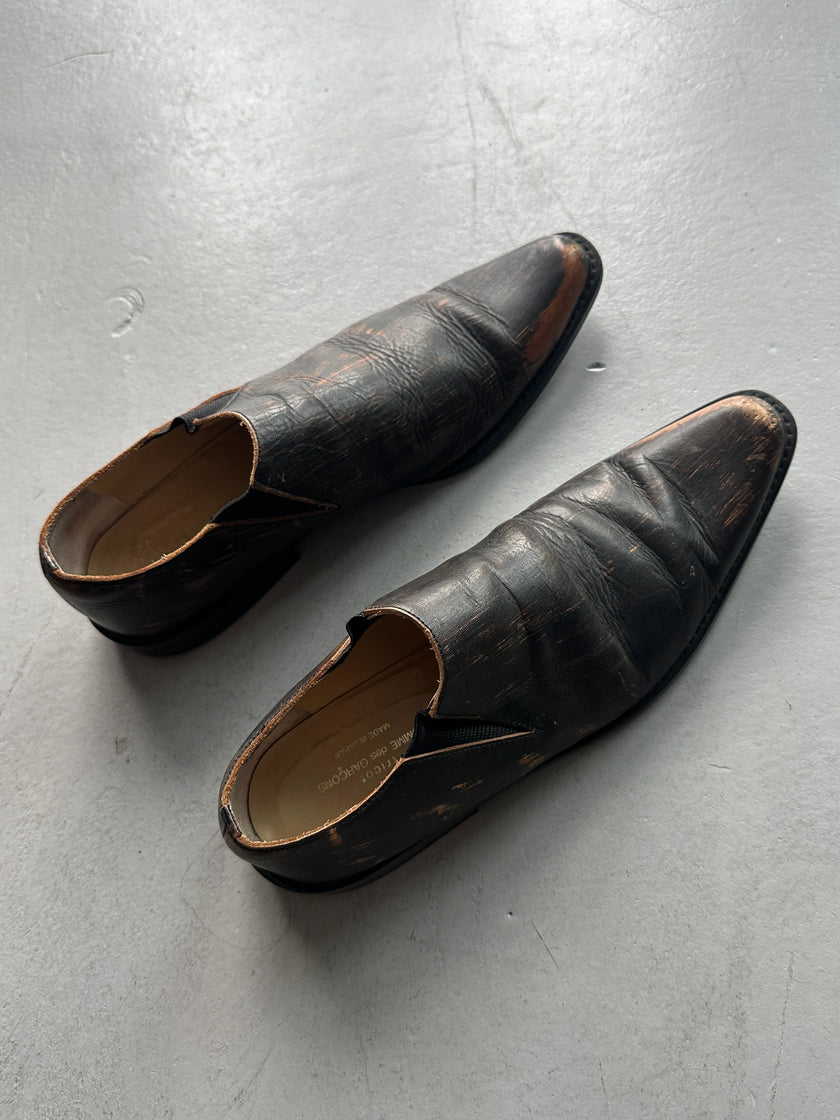 COMME DES GARÇONS - 1990s DISTRESSED LEATHER POINTED SLIP ON SHOES