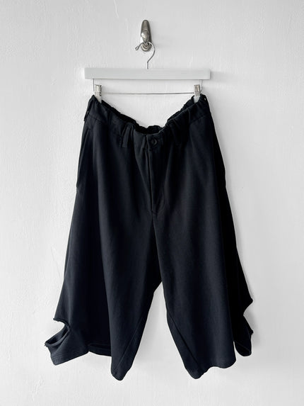 YOHJI YAMAMOTO - S/S 2025 TRACK SHORTS WITH CUT OUT DETAILS AT HEM