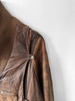 MARITHÉ & FRANÇOIS GIRBAUD X COMPAGNIE DES MONTAGNES & DES FORÊTS - 1980s DISTRESSED LEATHER BOMBER JACKET WITH HIGH RIBBED NECK