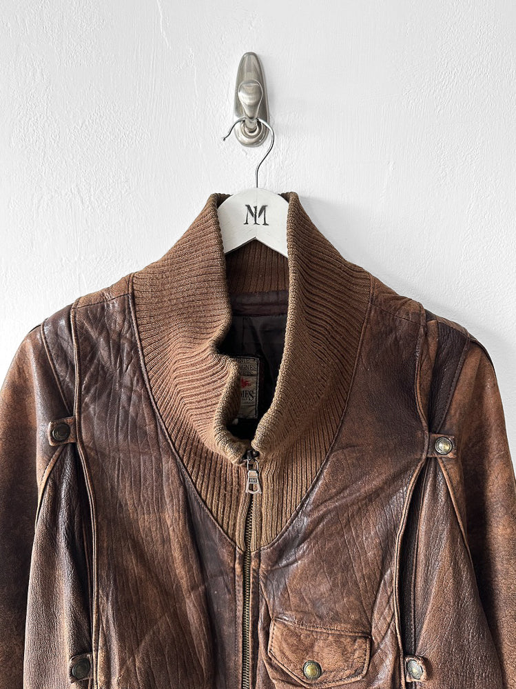 MARITHÉ & FRANÇOIS GIRBAUD X COMPAGNIE DES MONTAGNES & DES FORÊTS - 1980s DISTRESSED LEATHER BOMBER JACKET WITH HIGH RIBBED NECK