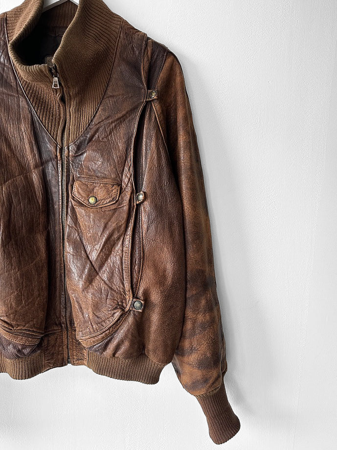 MARITHÉ & FRANÇOIS GIRBAUD X COMPAGNIE DES MONTAGNES & DES FORÊTS - 1980s DISTRESSED LEATHER BOMBER JACKET WITH HIGH RIBBED NECK