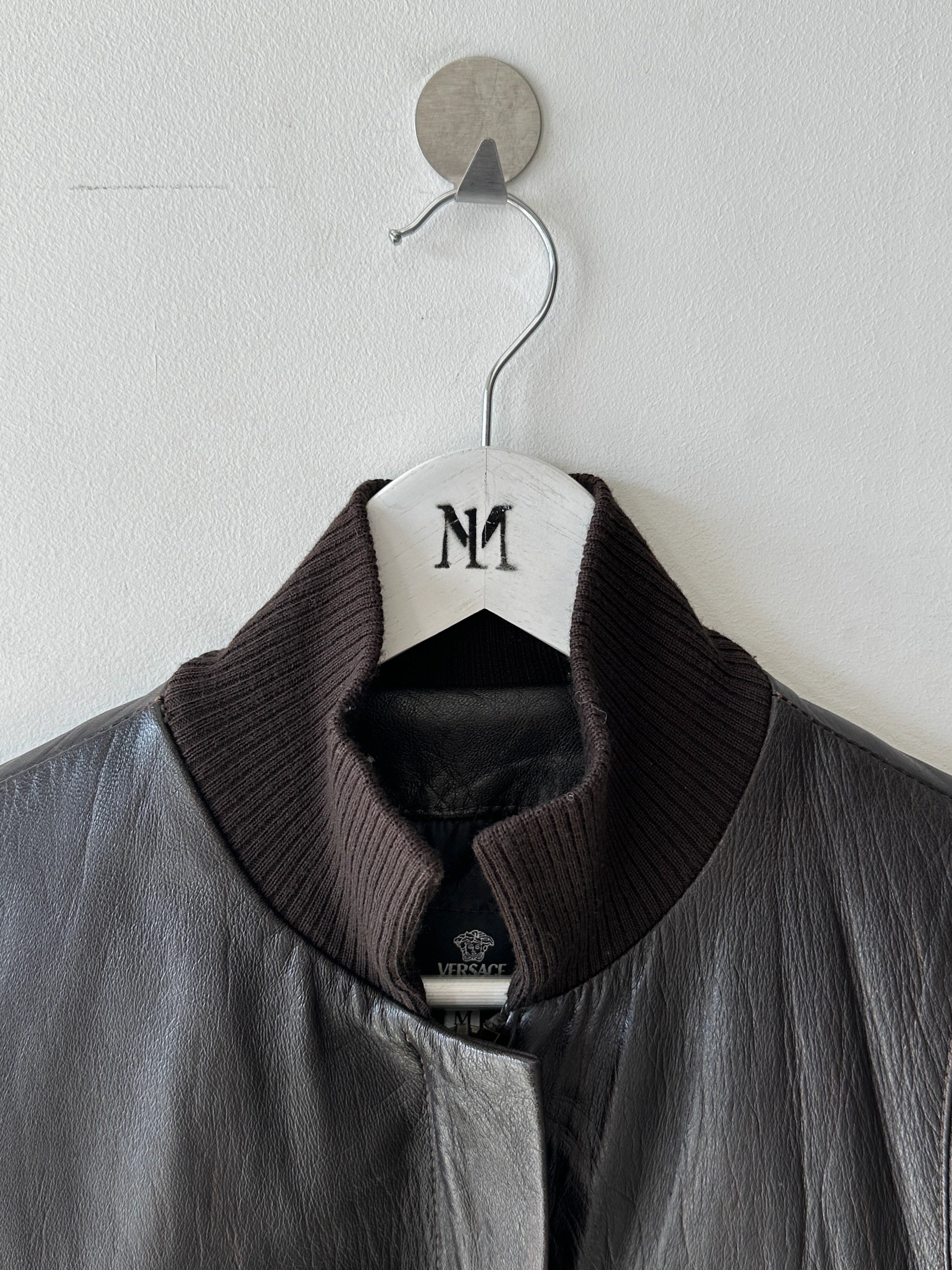 VERSACE - 2000s CROP FIT LEATHER JACKET WITH BONDAGE DETAILS