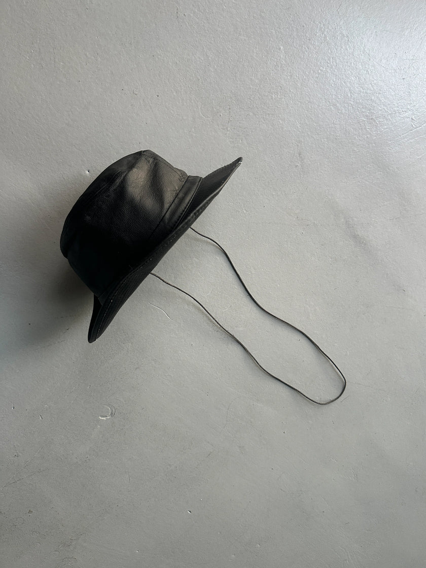 AGNÈS B. - 1990s FAUX LEATHER HAT WITH LONG CHIN STRAP
