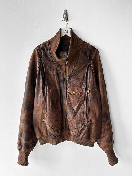 MARITHÉ & FRANÇOIS GIRBAUD X COMPAGNIE DES MONTAGNES & DES FORÊTS - 1980s DISTRESSED LEATHER BOMBER JACKET WITH HIGH RIBBED NECK