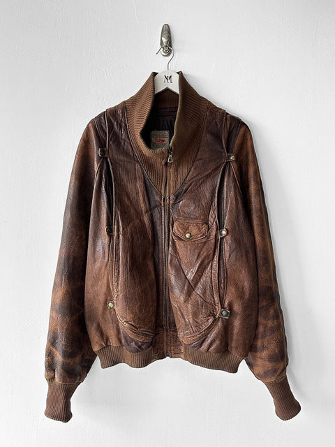MARITHÉ & FRANÇOIS GIRBAUD X COMPAGNIE DES MONTAGNES & DES FORÊTS - 1980s DISTRESSED LEATHER BOMBER JACKET WITH HIGH RIBBED NECK