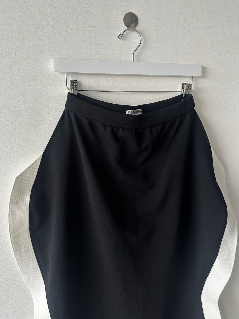 ISSEY MIYAKE -  F/W 2023 SCULPTURAL SKIRT WITH CURVED SIDE PANELS