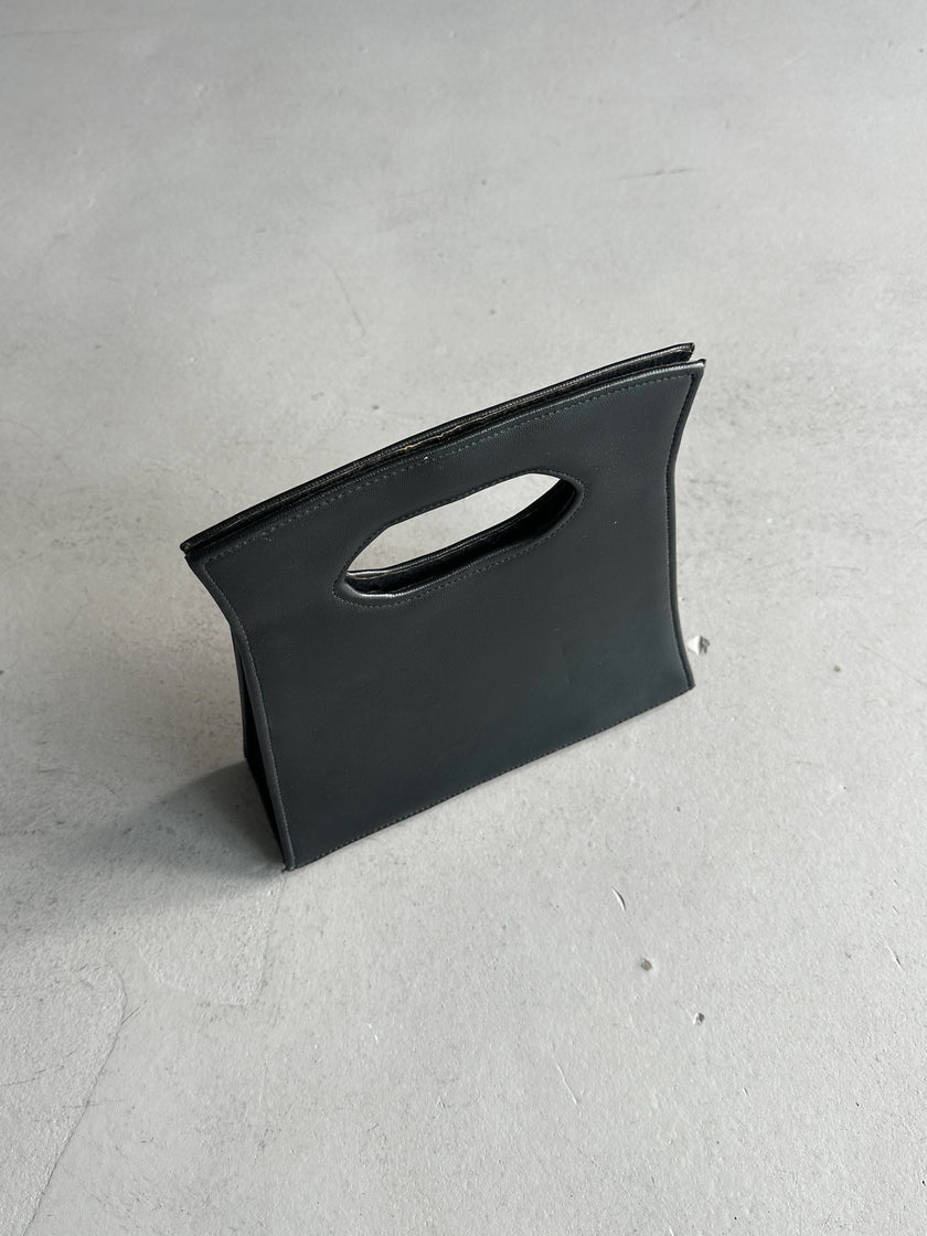 1990s CUT OUT HANDLE LEATHER BAG