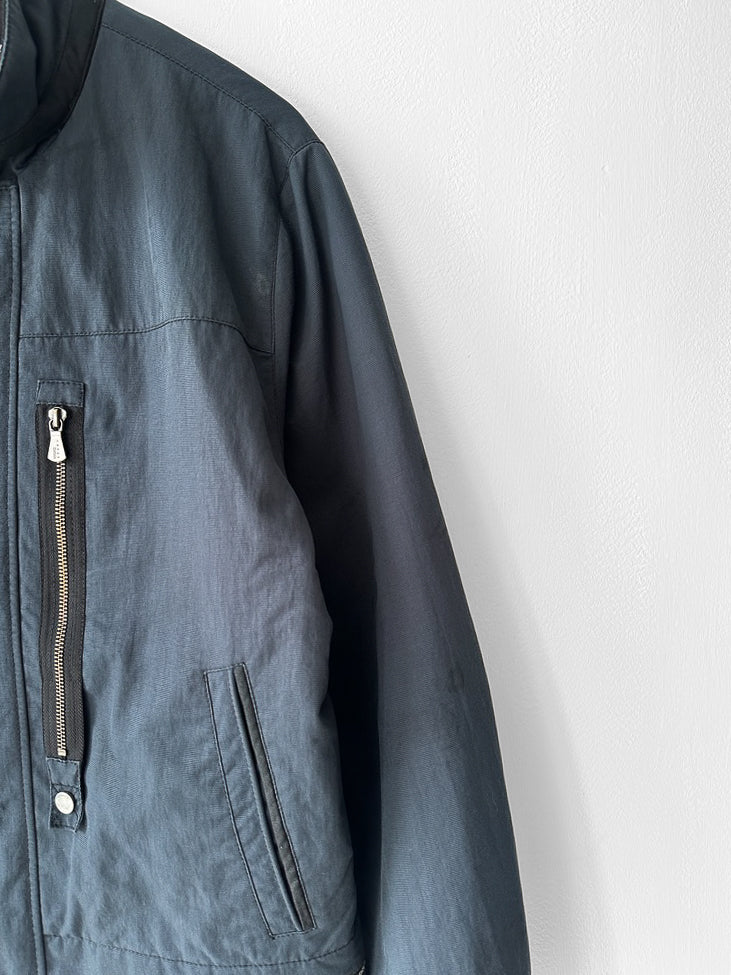 VERSACE - 1990s TECHNICAL JACKET WITH CONTRASTING THROAT STRAP