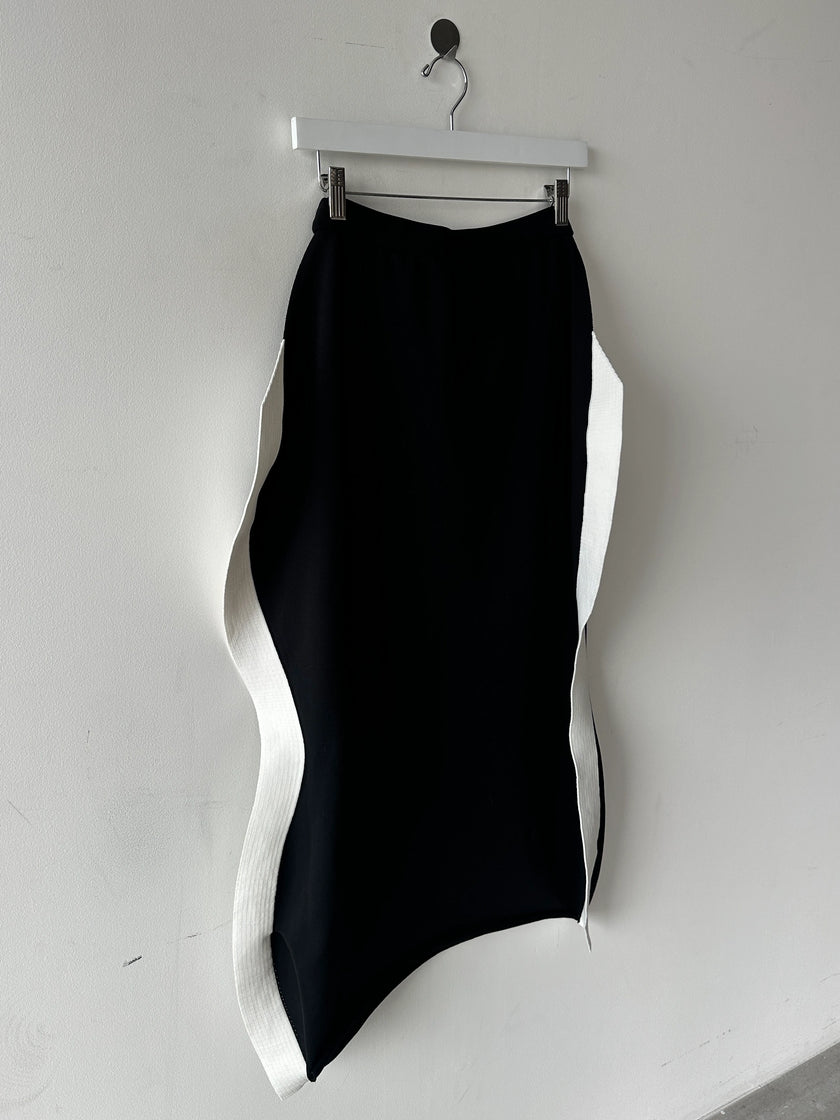 ISSEY MIYAKE -  F/W 2023 SCULPTURAL SKIRT WITH CURVED SIDE PANELS
