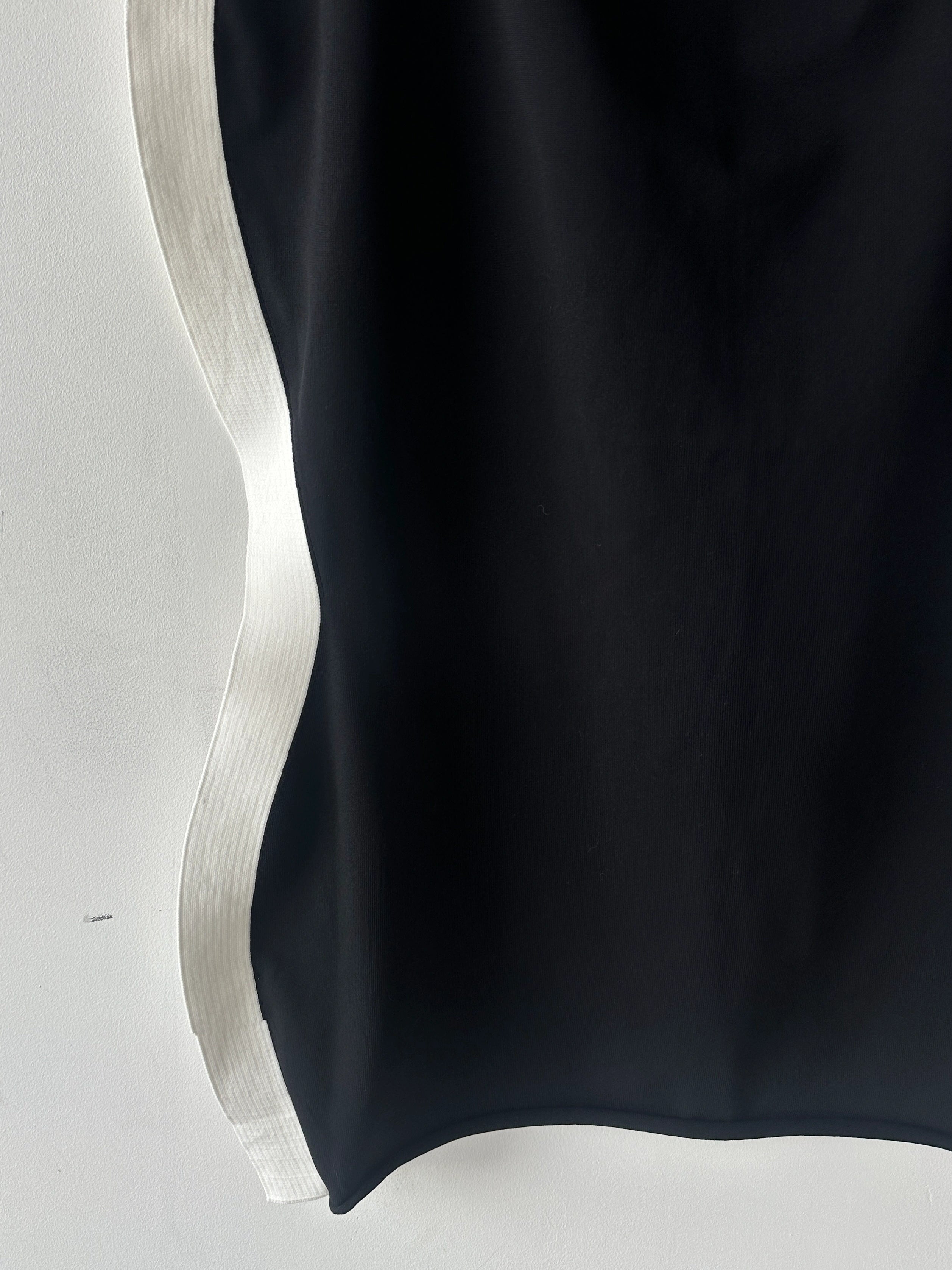 ISSEY MIYAKE -  F/W 2023 SCULPTURAL SKIRT WITH CURVED SIDE PANELS