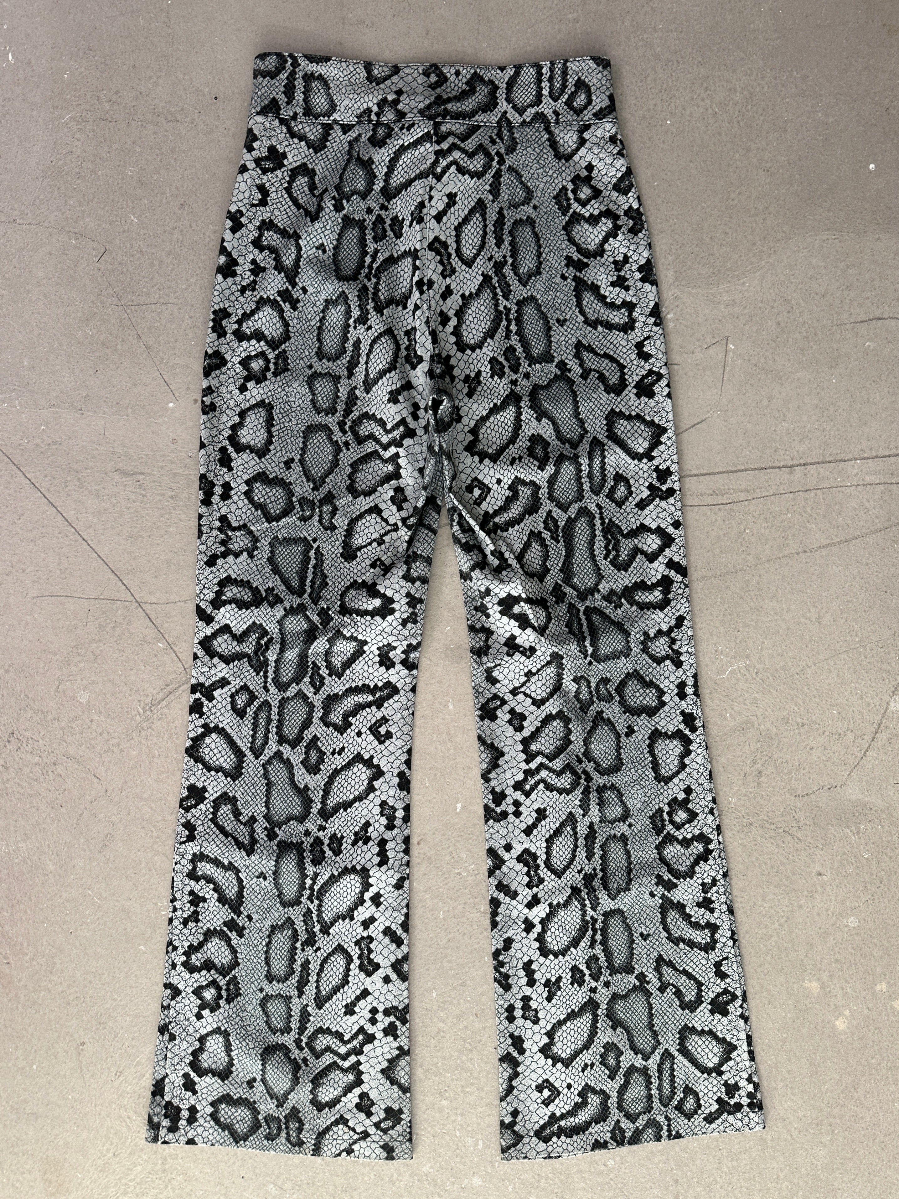 SNAKE PRINT FLARED LEG TROUSERS