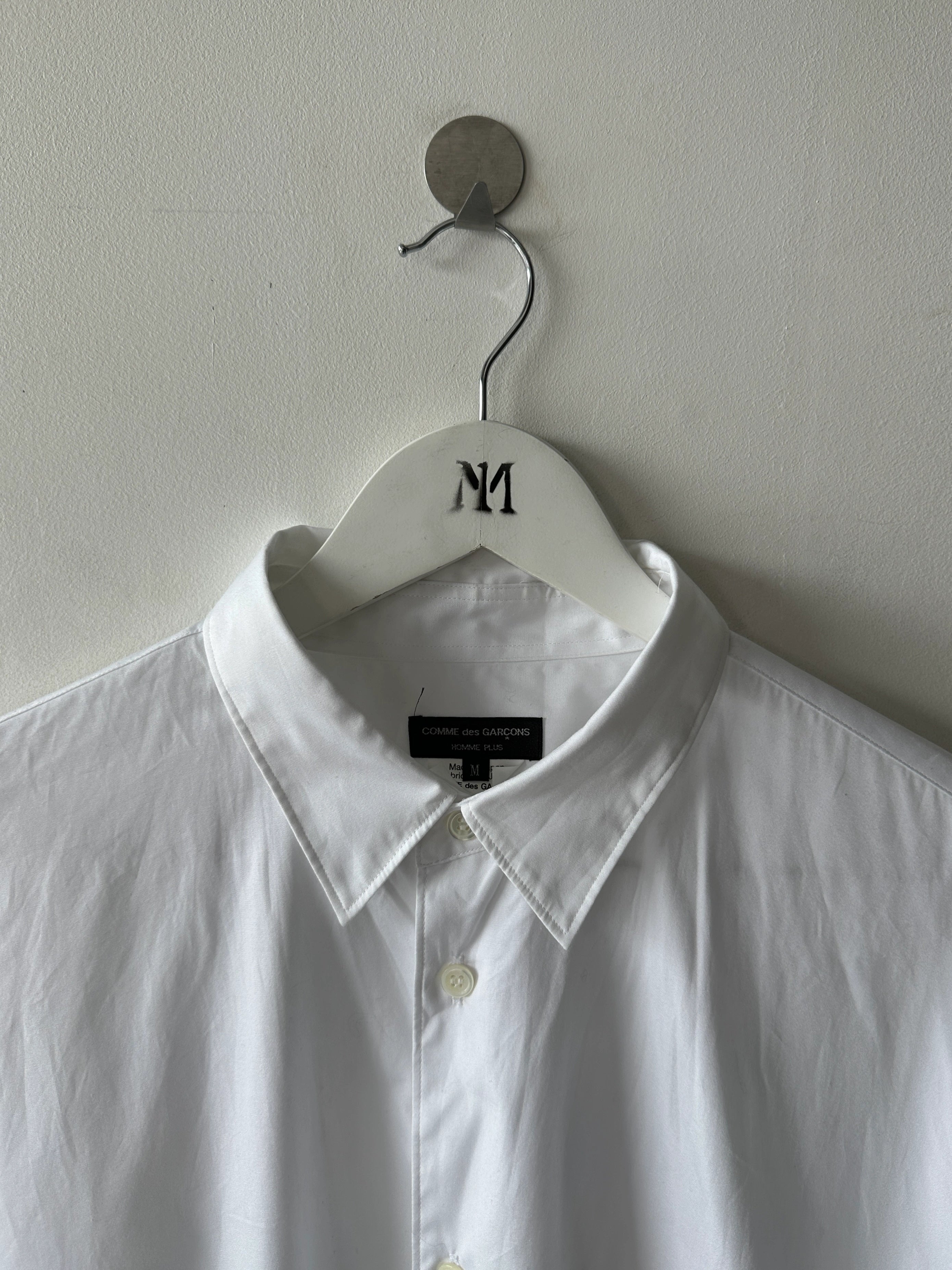 COMME DES GARÇONS - F/W 2024 ASYMMETRICAL SHIRT WITH PATCHWORK HEM PANELS