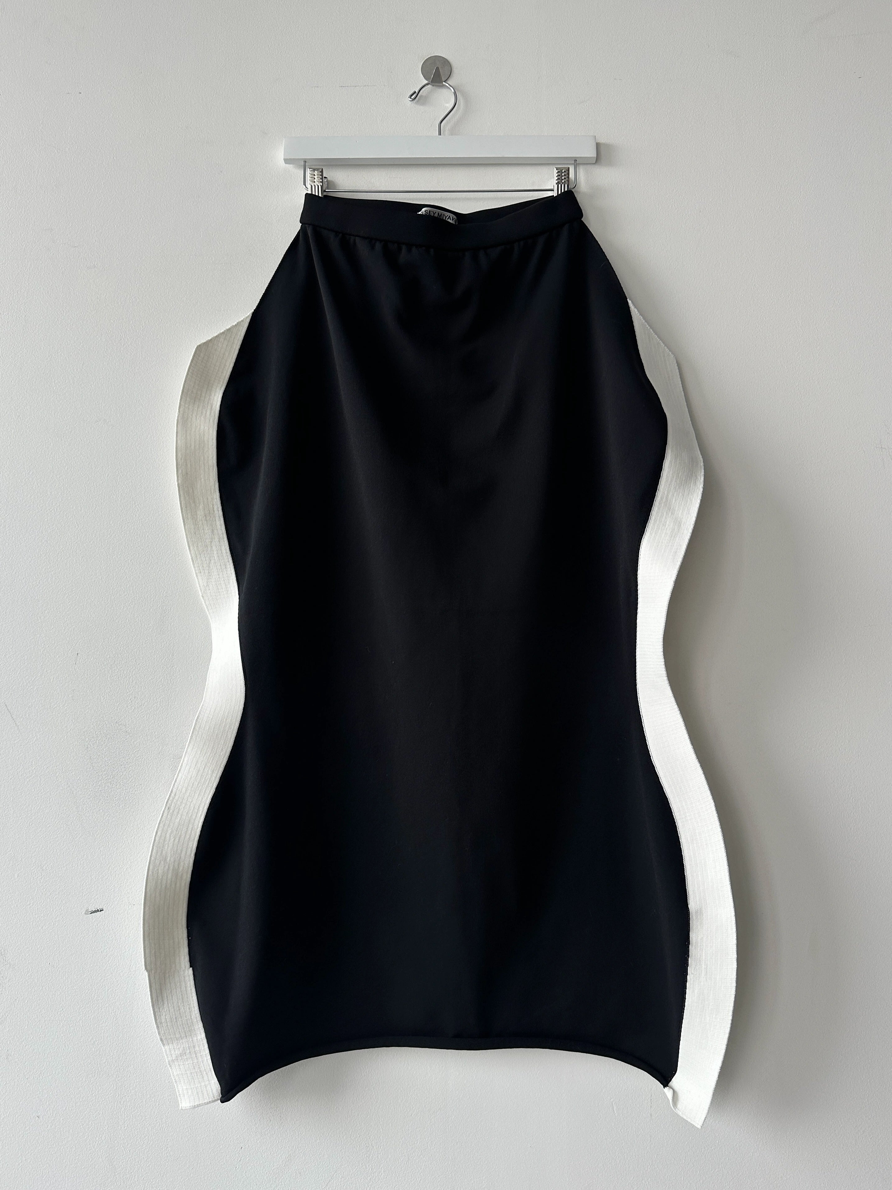ISSEY MIYAKE -  F/W 2023 SCULPTURAL SKIRT WITH CURVED SIDE PANELS