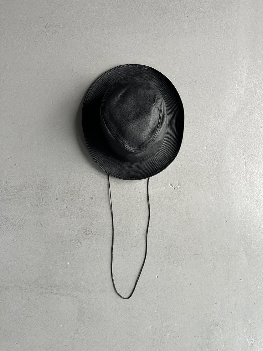 AGNÈS B. - 1990s FAUX LEATHER HAT WITH LONG CHIN STRAP