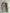 COP COPINE - 2000s RELAXED TEXTURED COAT WITH CROSSED DOUBLE LEATHER BELT